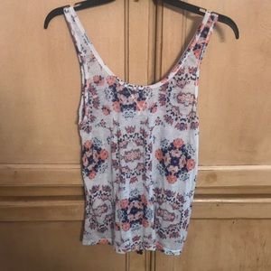 White, floral, and colorful tank top